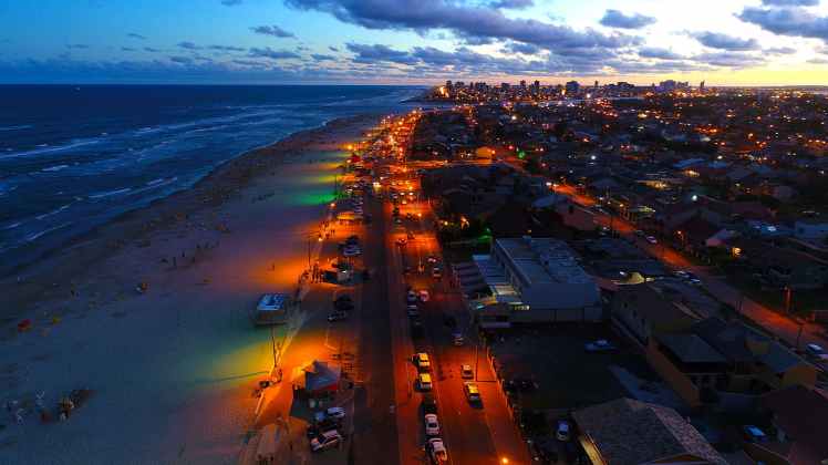 aerial photography of city and seashore